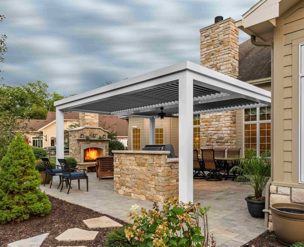 louvered pergola - grandseabuilding.com A cozy backyard patio pergola with outdoor fireplace from Grandsea Building