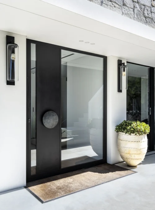 glass front doors-1 - grandseabuilding.com a modern entryway with pivot front doors — ideal for accessibility