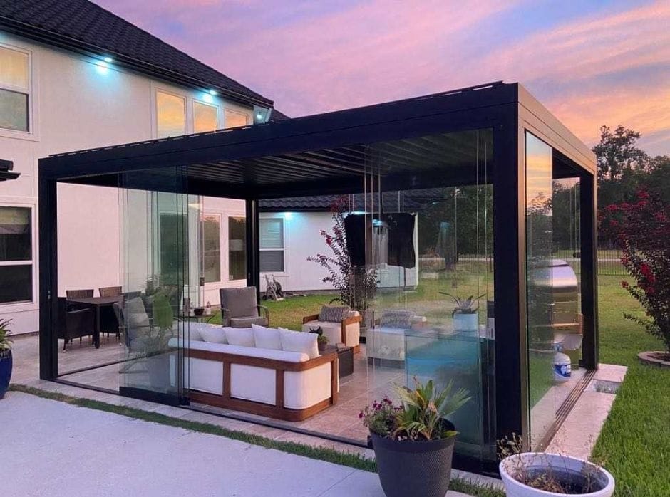 a custom covered pergola with sliding doors and cozy seating area - grandseabuilding.com a custom covered pergola with sliding doors and cozy seating area