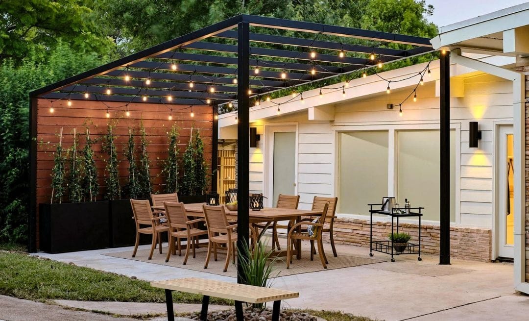 a stylish patio with a 10 x 10 pergola and string lights - grandseabuilding.com